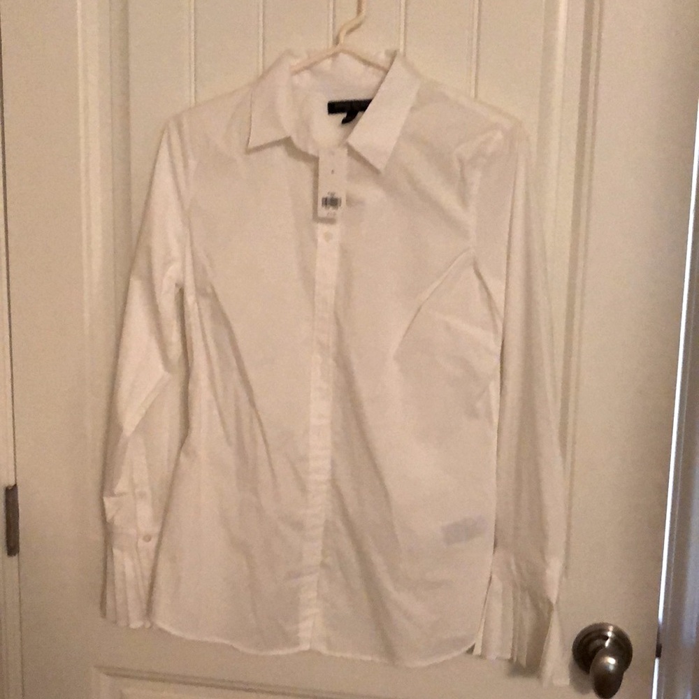 New Banana Republic white shirt with pleated sleeves. Never worn..tags on